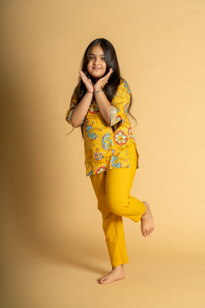 Yellow floral embroidered short kurta & pant set for girls