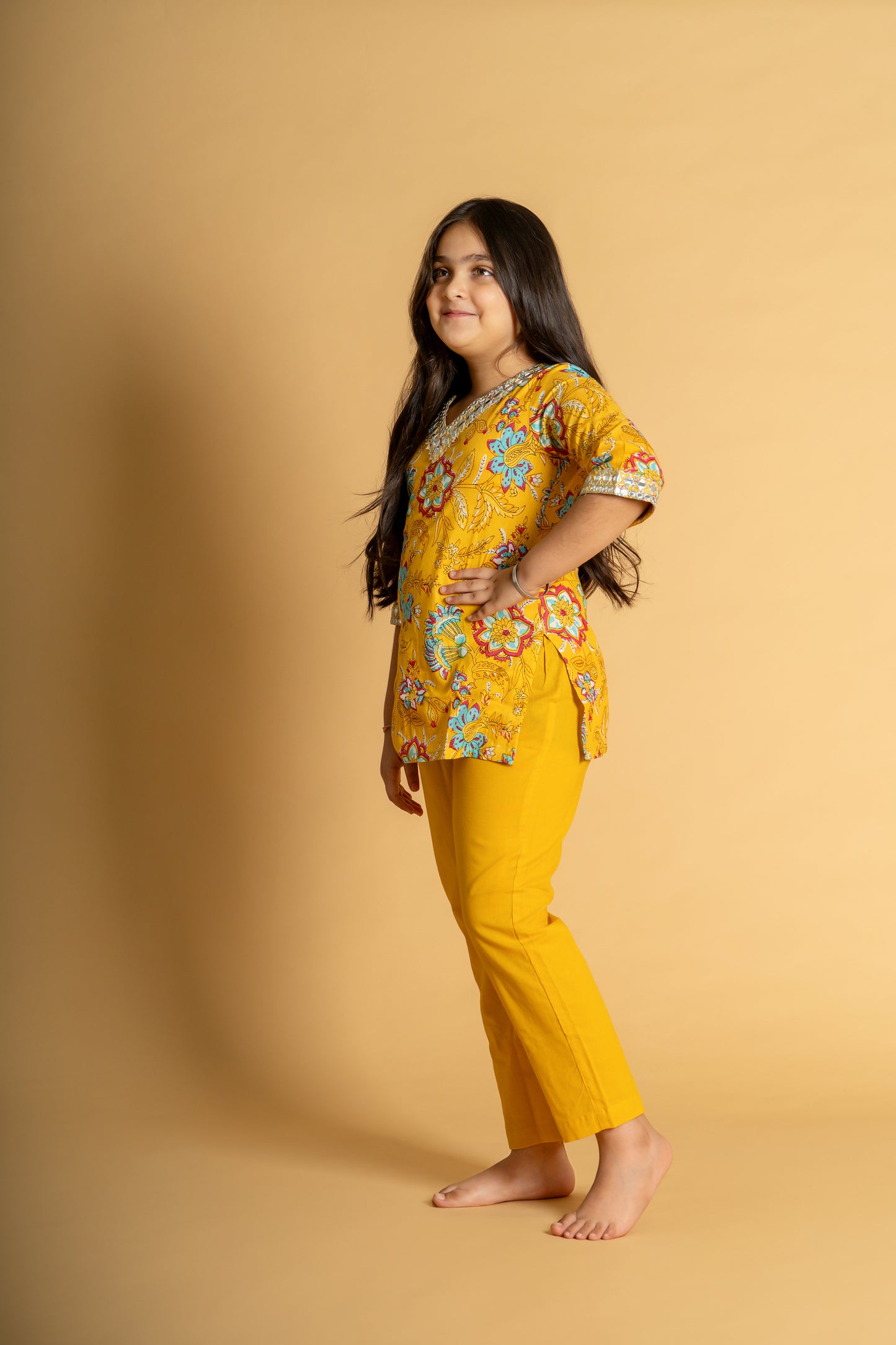 Yellow floral embroidered short kurta & pant set for girls